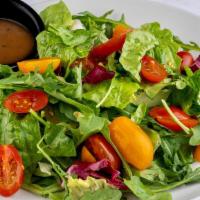 Garden Salad · Spring greens, cherry tomatoes and choice of salad dressing.