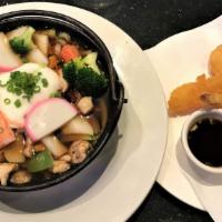 Nabe Yaki Udon Soup · Chicken, egg, mixed vegetables in soup, and three pieces of fried shrimp on the side.