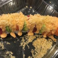 Julie Roll · Shrimp tempura, cream cheese, and jalapeño inside, topped with tuna, salmon, avocado, crunch...