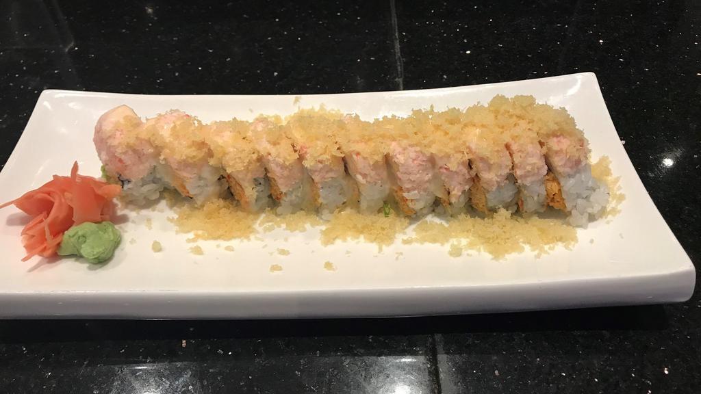 Pokemon Roll (Cooked) · Crab stick, crawfish, and avocado inside, topped with snow crab and crunchy flakes.