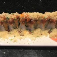 Terry Roll · Shrimp tempura and avocado inside, topped with fresh salmon, spicy tuna, crunchy flakes, mas...