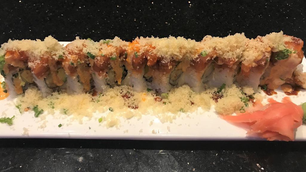 Terry Roll · Shrimp tempura and avocado inside, topped with fresh salmon, spicy tuna, crunchy flakes, masago, and scallions drizzled with spicy mayo and eel sauce.