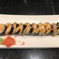 Christmas Roll · Spicy yellowtail, shrimp tempura, avocado, masago, and snow crab inside, topped with spicy m...