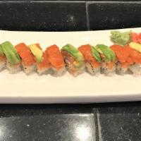 Narida Roll · Coconut shrimp tempura and snow crab inside, topped with spicy salmon and avocado.
