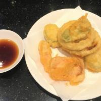 Vegetable Tempura App · Deep fried 8 pcs vegetable. tempura sauce on side.