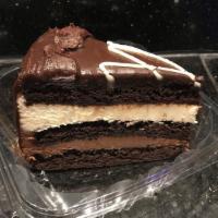 White& Dark Chocolate Mousse Cake · Mousse cake made with sweet and milk chocolate, amaretto, and butterscotch liqueurs, cream, ...