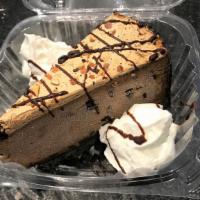 Mississippi Mud Pie · Rich mocha almond fudge ice cream in a dark cookie crust deliciously finished with whipped t...