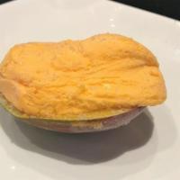 Mango Fruit Shell · Tantalizing mango sorbet made from sweetened fresh fruit then served in its own fresh fruit ...