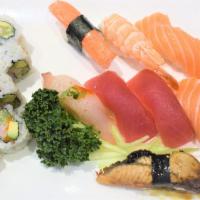 Sushi A (9 Pcs Sushi And 8 Pcs Rolls) · Three pieces of salmon, two pieces of tuna, one piece of white fish, one piece of shrimp, on...