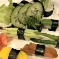 Vegetable Sushi And Roll Combo · 6 pieces sushi:  1 avocado , 1  black mushroom, 1 tofu skin, 1 asparagus, 1 seaweed salad, 1...