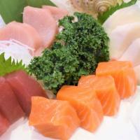 Sashimi Deluxe (14 Pcs) · 14 pieces of sashimi: three pieces of tuna, three pieces of salmon, four pieces of super whi...