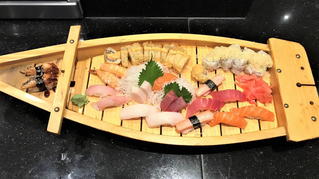 Hana Boat For 2 · 14 pieces of sushi, six pieces of sashimi, and snow crab roll (8 pcs), tempura dynamite roll (8 pcs ).