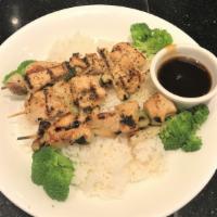 Chicken Yakitori Don · 3 Grilled chicken skewers with teriyaki sauce over rice.