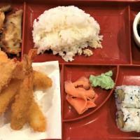 Shrimp Tempura Bento Box · Served with miso soup salad pan-fried dumplings california roll or vegetable tempura and ste...