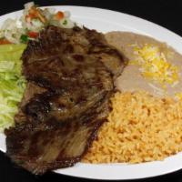 Carne Asada · Guacamole, pico de gallo, lettuce under the meat, and rice and beans on the side. Your choic...