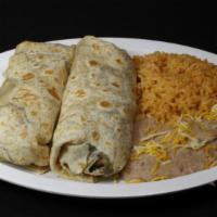Beef Burritos (2) · Served with bell peppers, onions, tomato, beans, cheese, and rice and beans on the side.