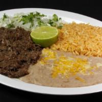 Barbacoa · Barbacoa with cilantro and onions and rice and beans on the side. Your choice of corn or flo...