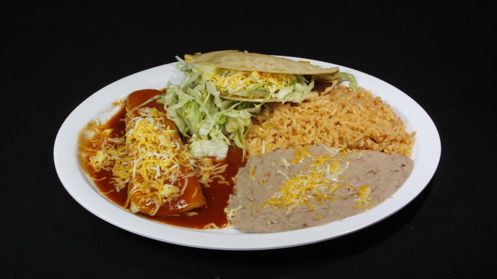 Taco & Enchilada · Served with a cheese enchilada with salsa enchilada, cheese, lettuce on top, and rice and beans on the side, and a shredded beef taco with lettuce and cheese inside.