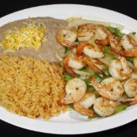 Shrimp Plate · Shrimp with bell peppers and onions and rice and beans on the side. Your choice of corn or f...