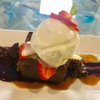 Chocolate Stout Brownie Meltdown · Warm chocolate stout brownie made with local made vanilla bean ice cream, and drizzled with ...