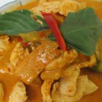 Red Curry · Slice meat in red curry with coconut milk, bamboo shoot, bell peppers, green bean and basil ...