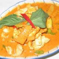 Panang Curry · Panang curry with bell pepper topped with coconut milk.