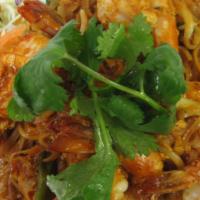 Pad Thai · Stir-fried rice noodles with bean sprouts, onions, egg, and peanuts in Pad Thai sauce.