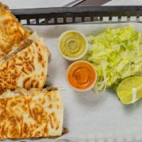 Quesadillas · Choice of meat , pico de gallo, sour cream, cheese, jalapeno (lettuce on the side).