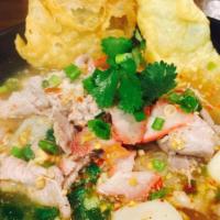 Tom Yum Soup · A famous Thai soup mand with exotic lemongrass,Thai herbs,kaffir lime leaf,mushroom,tomato,o...