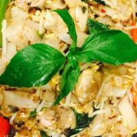Drunken Noodles · Wok fried flat rice noodle with egg, tomato, bell peppers, mushroom, bean sprouts, basil, an...