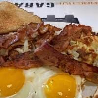 San Antonio Special · Two eggs, two pancakes, two bacon strips. Add ham for an additional charge.
