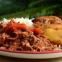 Ropa Vieja · Shredded beef, rice, beans, fried plantains and avocado.