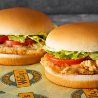 Crispy Chicken Sandwich · A breaded chicken patty with mayonnaise, lettuce, and tomatoes.