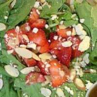 Strawberry Feta Salad · Spinach, Strawberries, Feta, Sliced Almonds. Served with House Dressing.