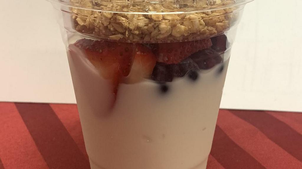 Yogurt Parfait · Vanilla yogurt with fresh blueberries, strawberries, and granola.