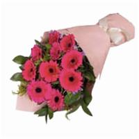 Gerbera · An arrangement with 10 pink gerberas.