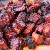 Jerk Pork · Marinated in our house seasoning and slow roasted to fall apart tenderness.