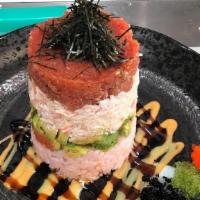 Ahi Tower · rice,avo,crabmeat,spicy tuna with eel sauce,spicy mayo,white sauce