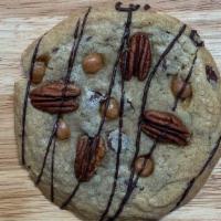 Turtle Infused · Loaded with chunks of pecans and caramel bits baked in and striped with sweet dark chocolate...