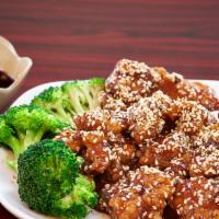 Ck02. Sesame Chicken · Sautéed with chicken breast, sesame seed, yellow onion. and carrot in sesame sauce.