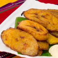 Fried Plantain With Beans · fried plantains with Black beans  with cream and cheese
