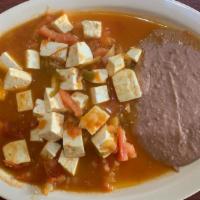 Queso A La Mexicana · Served with Beans, Breakfast Potatoes, and Tortillas