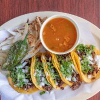 Mini Tacos · (5) CORN TORTILLA TACOS WITH CHOICE OF MEAT, CILANTRO, ONION, AND CHARRO BEANS