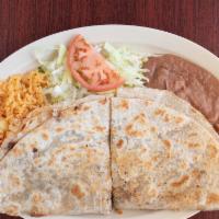 Quesadilla · CHOICE OF MEAT SERVED WITH RICE, BEANS, AND SALAD