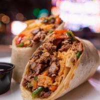 Texas Burrito · Chicken, shrimp, or steak burrito ( all 3 meats for an additional cost), peppers, onions, ja...