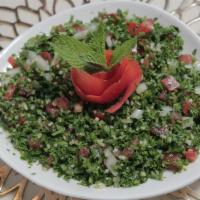 Tabbouleh · Fresh homemade chopped parsley mixed with salt, olive oil, and sumac.