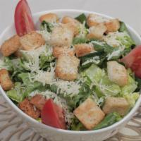 Caesar Salad · Romaine lettuce, croutons and Parmesan cheese.  (4 dollars extra for chicken)