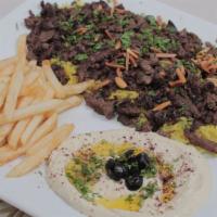 Shawarma Plate · Chicken or beef shawarma

Comes with 2 sides
Choice of: pita bread side salad French fries M...