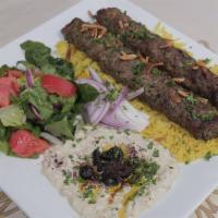 Beef Kofta Plate · Two skewers of all beef kofta served with your choice of pita bread side salad French fries ...