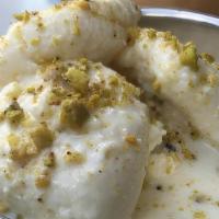 Ras Malai	 · Spiced softly with cardamom and delicate saffron.